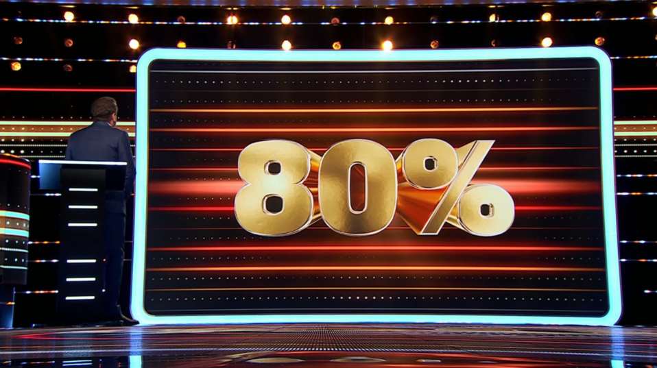 Screenshot of a game show displaying 80% in gold lettering.