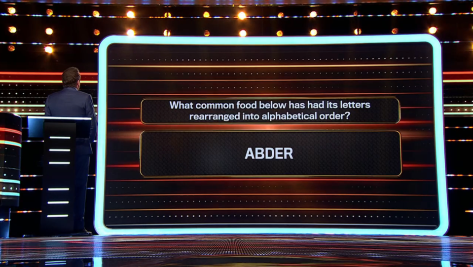 Screenshot of a game show screen displaying the question: "What common food below has had its letters rearranged into alphabetical order?" with the answer "ABDER".