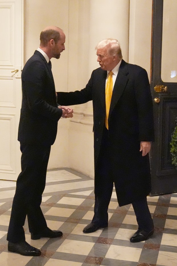 PARIS, FRANCE - DECEMBER 7: Britain's Prince William, Prince of Wales meets U.S. President-elect Donald Trump at the UK Ambassador's Residence on the day of the reopening ceremonies of the Notre-Dame de Paris Cathedral, five and a half years after a devastating fire on December 7, 2024 in Paris, France. (Photo by Aaron Chown - Pool/Getty Images)