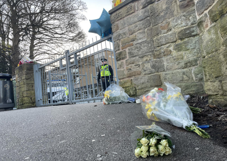 Floral tributes left outside All Saints Catholic High School, on Granville Road in Sheffield, South Yorkshire, after a 15-year-old boy died following a stabbing incident at the school. Picture date: Tuesday February 4, 2025. PA Photo. See PA story POLICE Sheffield. Photo credit should read: Sophie Robinson/PA Wire 
