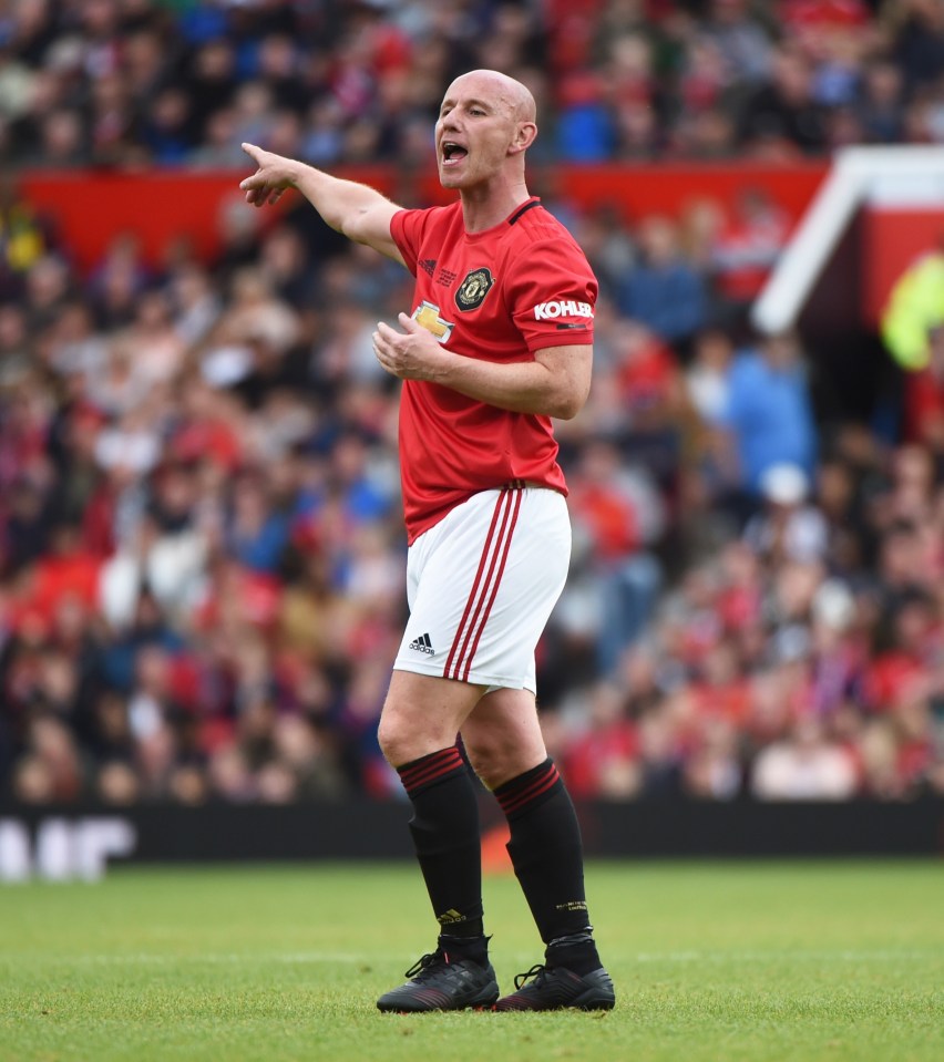 Nicky Butt of Manchester United gesturing during a game.