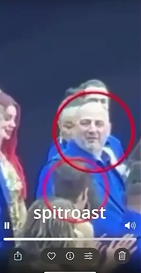 Screenshot of a video showing Wynne Evans with friends, labeled "spitroast".