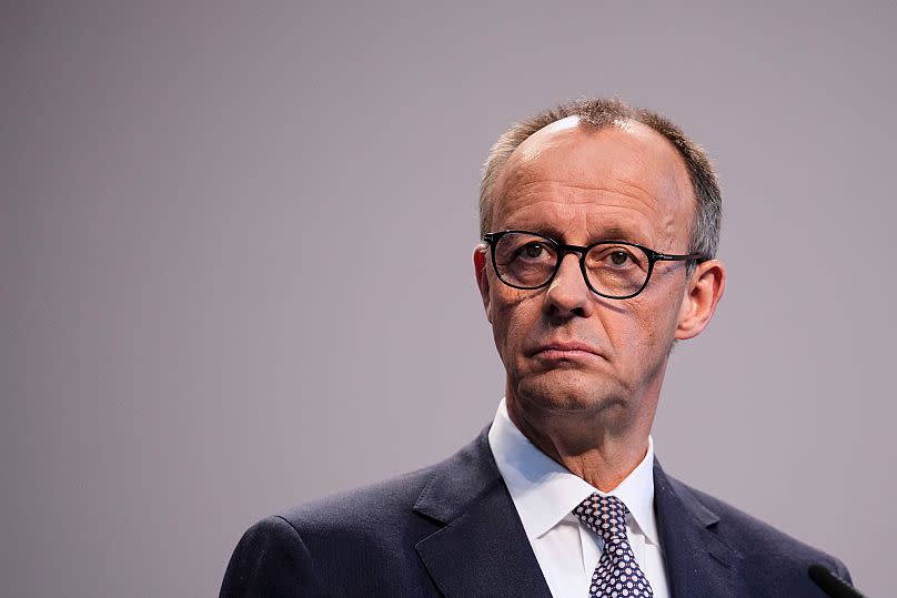 Friedrich Merz addresses the media after reaching an agreement for a new German government at a news conference in Berlin, 9 April, 2025