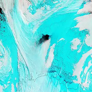 An arial view of the Maud Rise polynya. Scientists were baffled as to how this formed but now have an explanation. Credit: NASA Earth Observatory