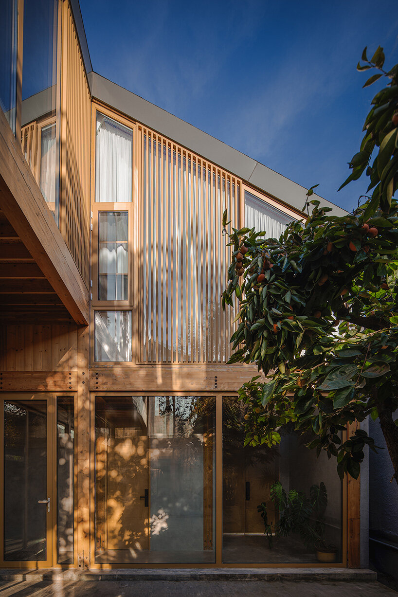 archstudio revives courtyard tradition with timber-framed guesthouse in beijing