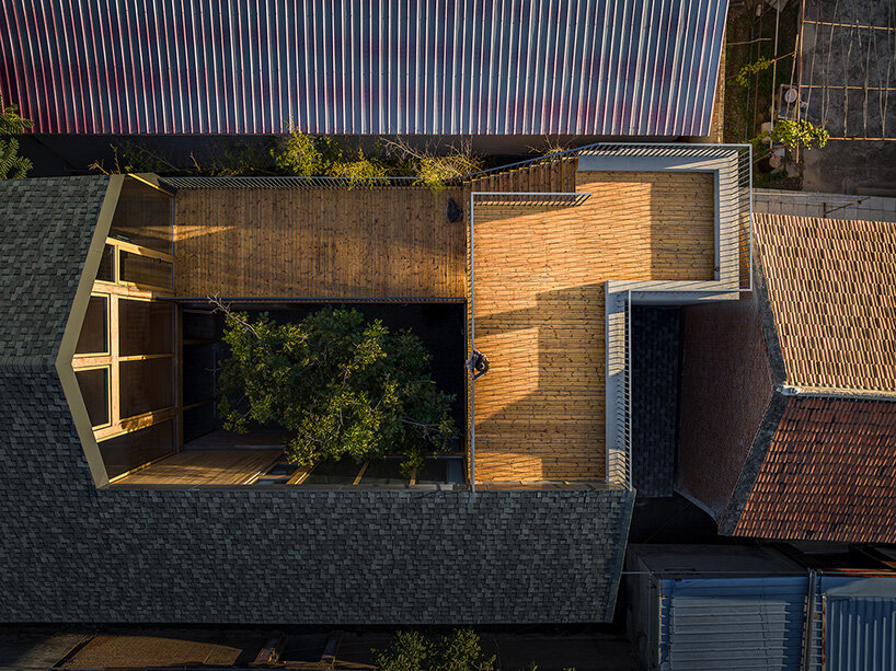 archstudio revives courtyard tradition with timber-framed guesthouse in beijing