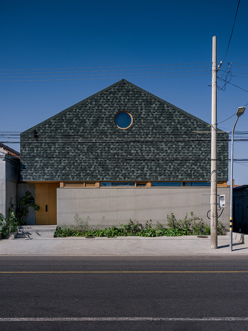 archstudio revives courtyard tradition with timber-framed guesthouse in beijing