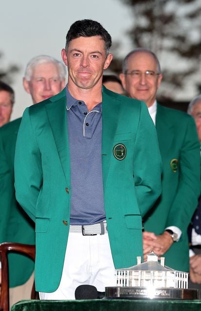 AUGUSTA, GEORGIA - APRIL 13: Rory McIlroy of Northern Ireland is congratulated after receiving the green jacket during the ceremony after the 2025 Masters Tournament at Augusta National Golf Club on April 13, 2025 in Augusta, Georgia. (Photo by Michael Reaves/Getty Images)