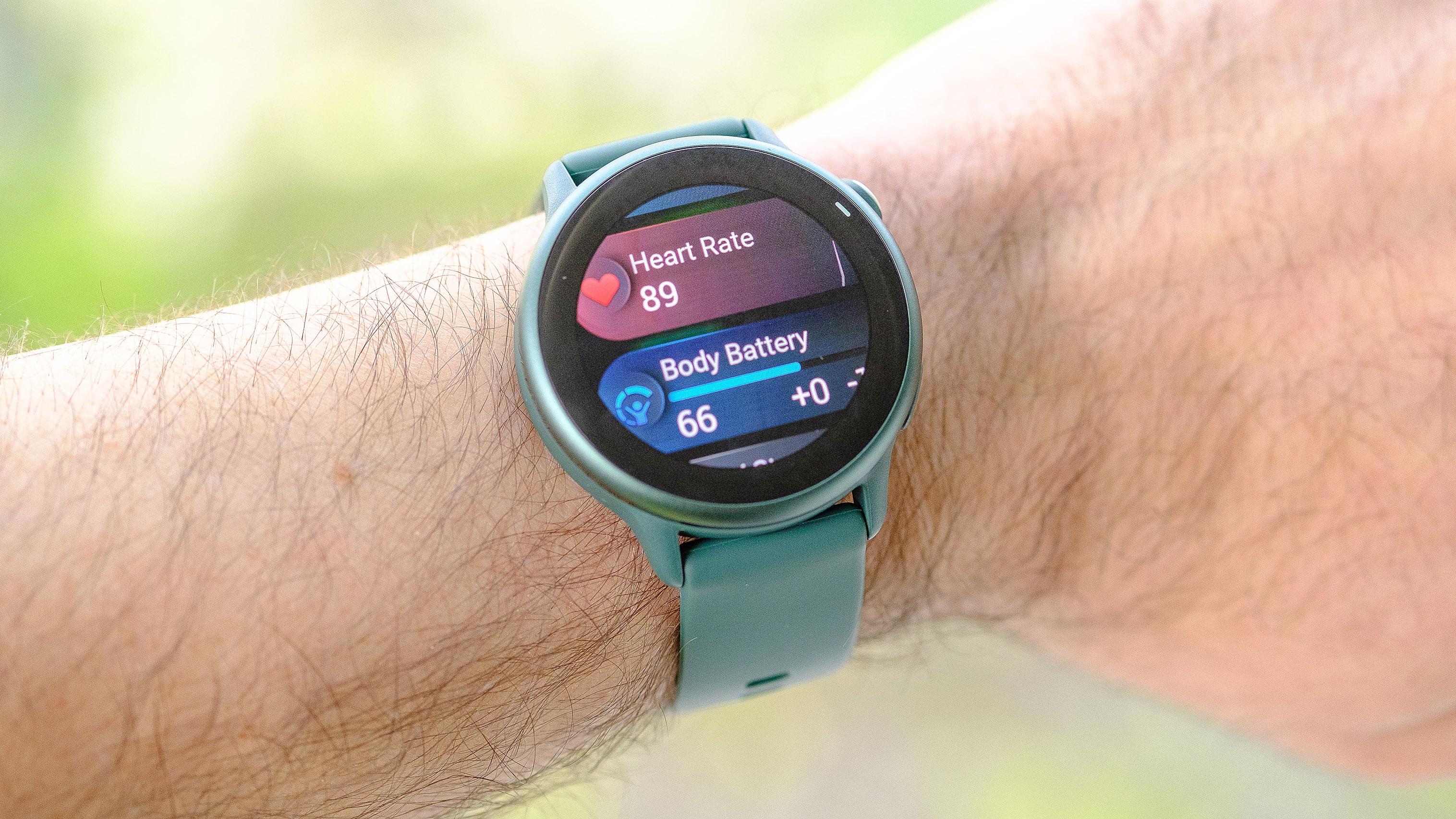 Close-up of the Garmin Vivoactive 6 smartwatch in green