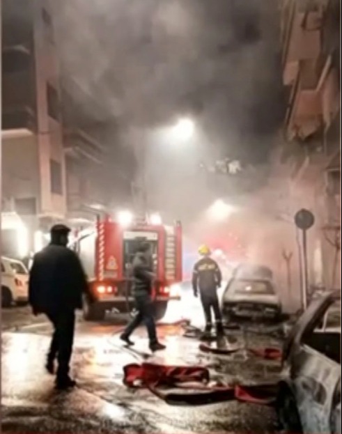 Burning car on Athens street during a riot.
