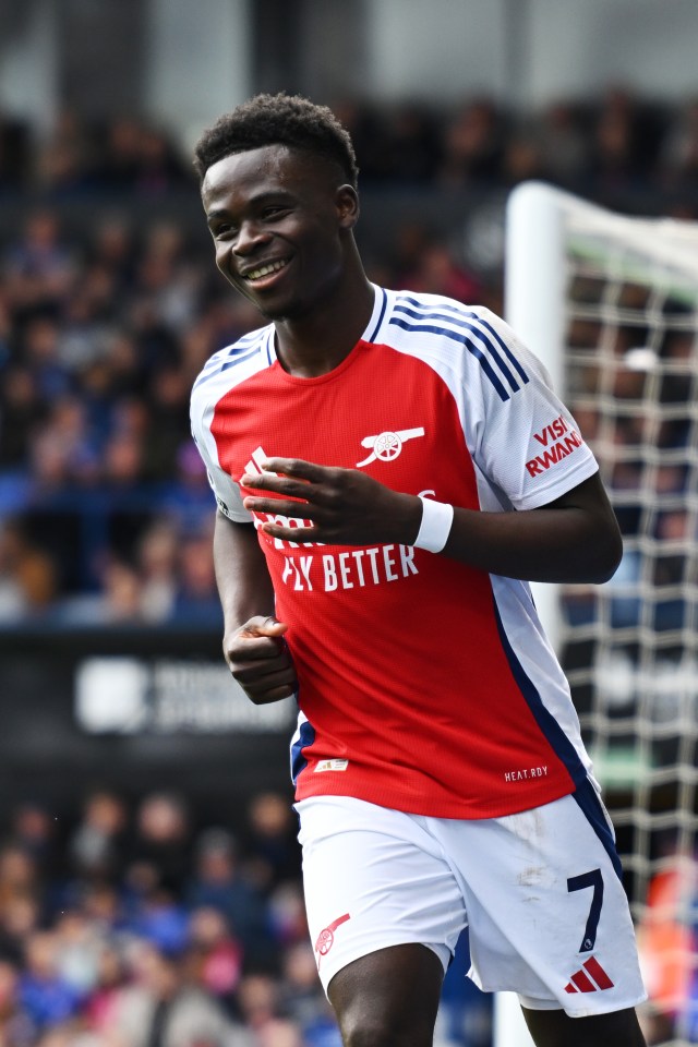 Bukayo Saka of Arsenal celebrating during a match.