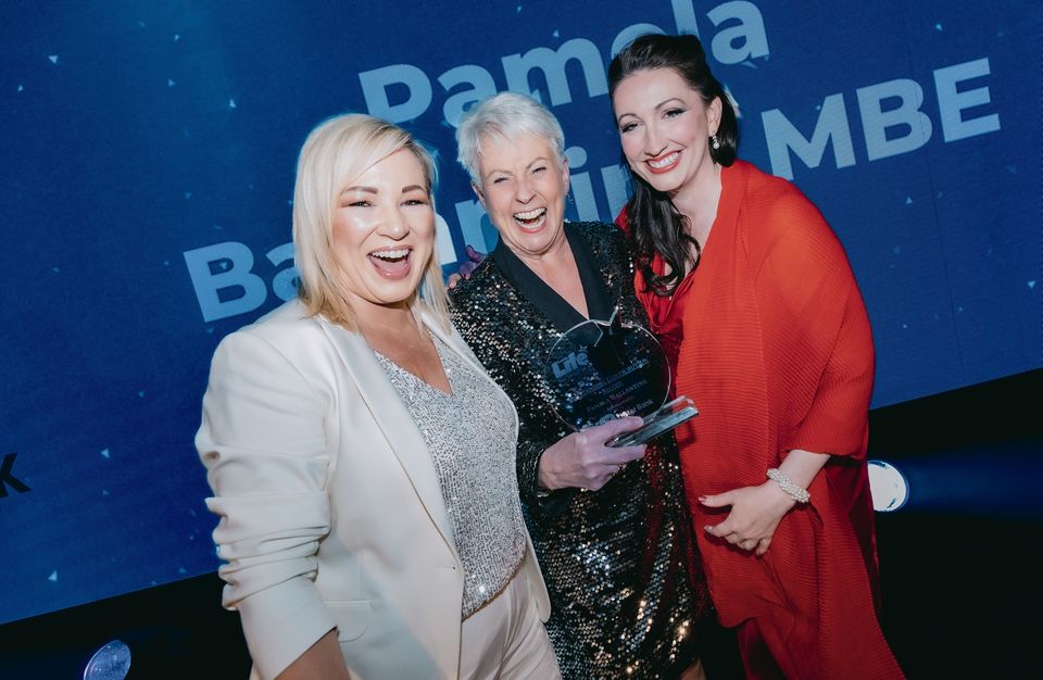 First Minister Michelle O’Neill and Deputy First Minister Emma Little-Pengelly with Pamela Ballantine