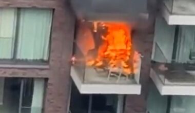 Huge fire engulfs two flats in east London block with 100 firefighters sent to scene