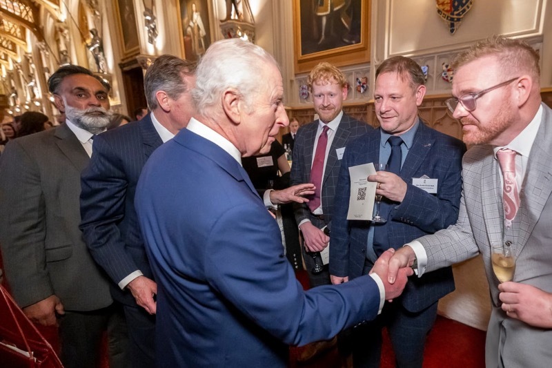 Proud day as band members meet King Charles