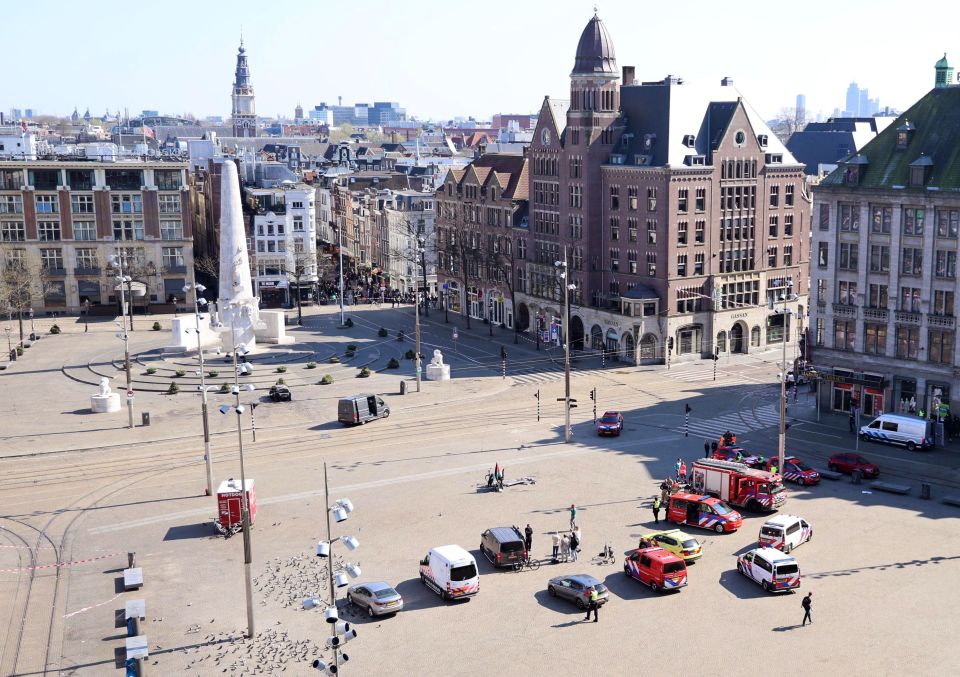 Burned-out car on Dam Square in Amsterdam near the National Monument.