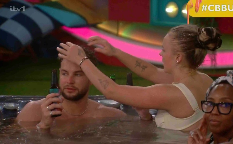 Chris Hughes and JoJo Siwa in a hot tub.