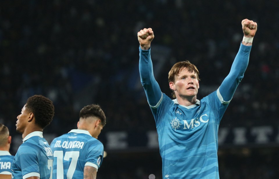 Scott McTominay celebrates a goal with Napoli teammates.