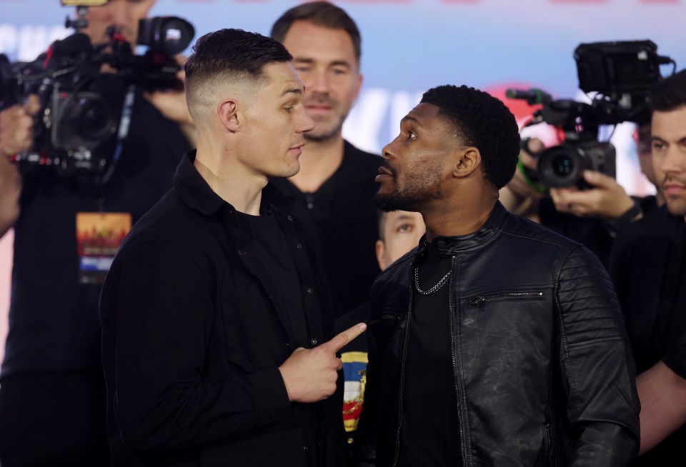 Chris Billam-Smith and Brandon Glanton facing off at a press conference.