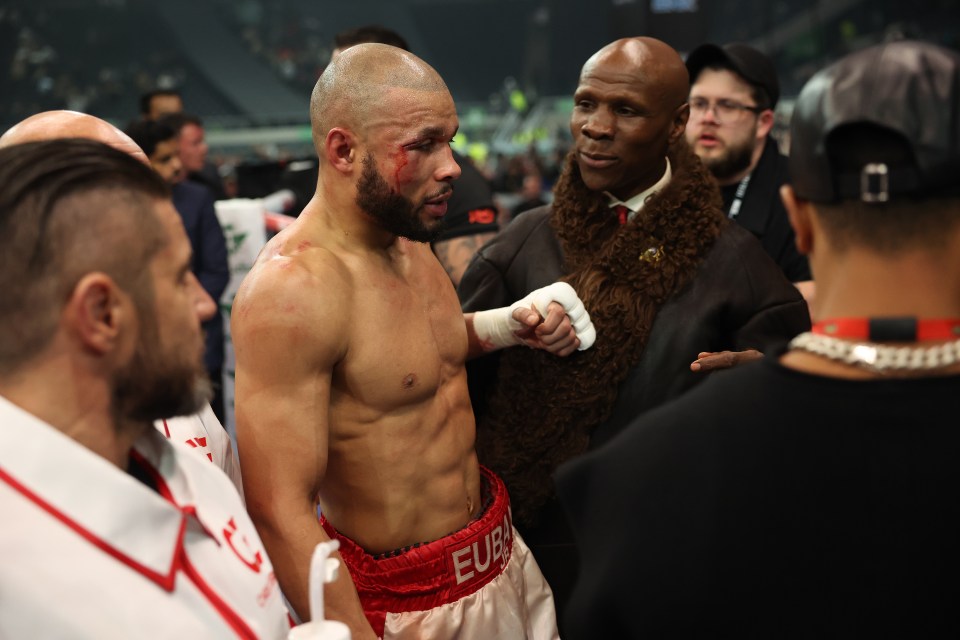 Chris Eubank Jr. and his father Chris Eubank after a boxing match.