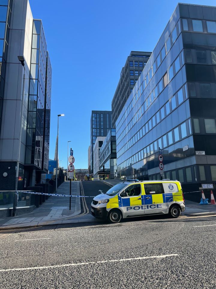 Police van at a Glasgow hotel during an emergency.