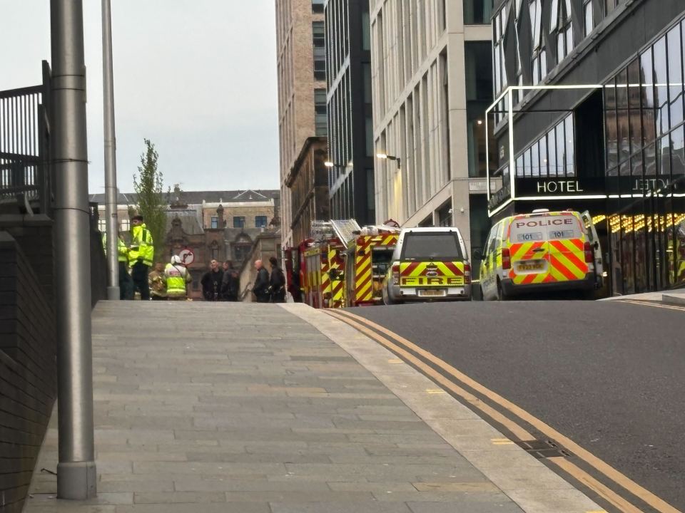 Police and fire crews outside a hotel in Glasgow.