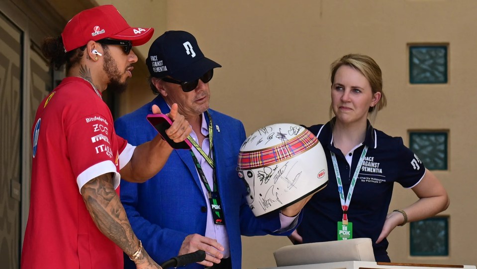 All 20 living F1 world champions, including Hamilton and Schumacher, have signed the helmet