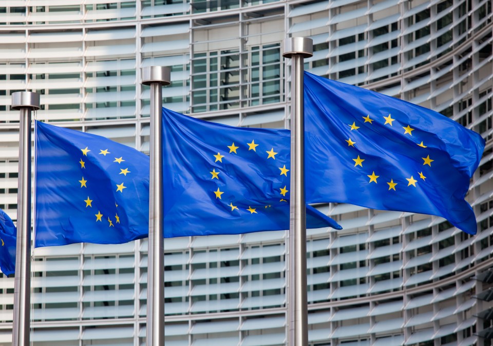European flags waving in front of the Berlaymont building.