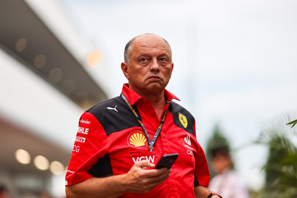 Fred Vasseur, Ferrari team principal, looking at his phone.