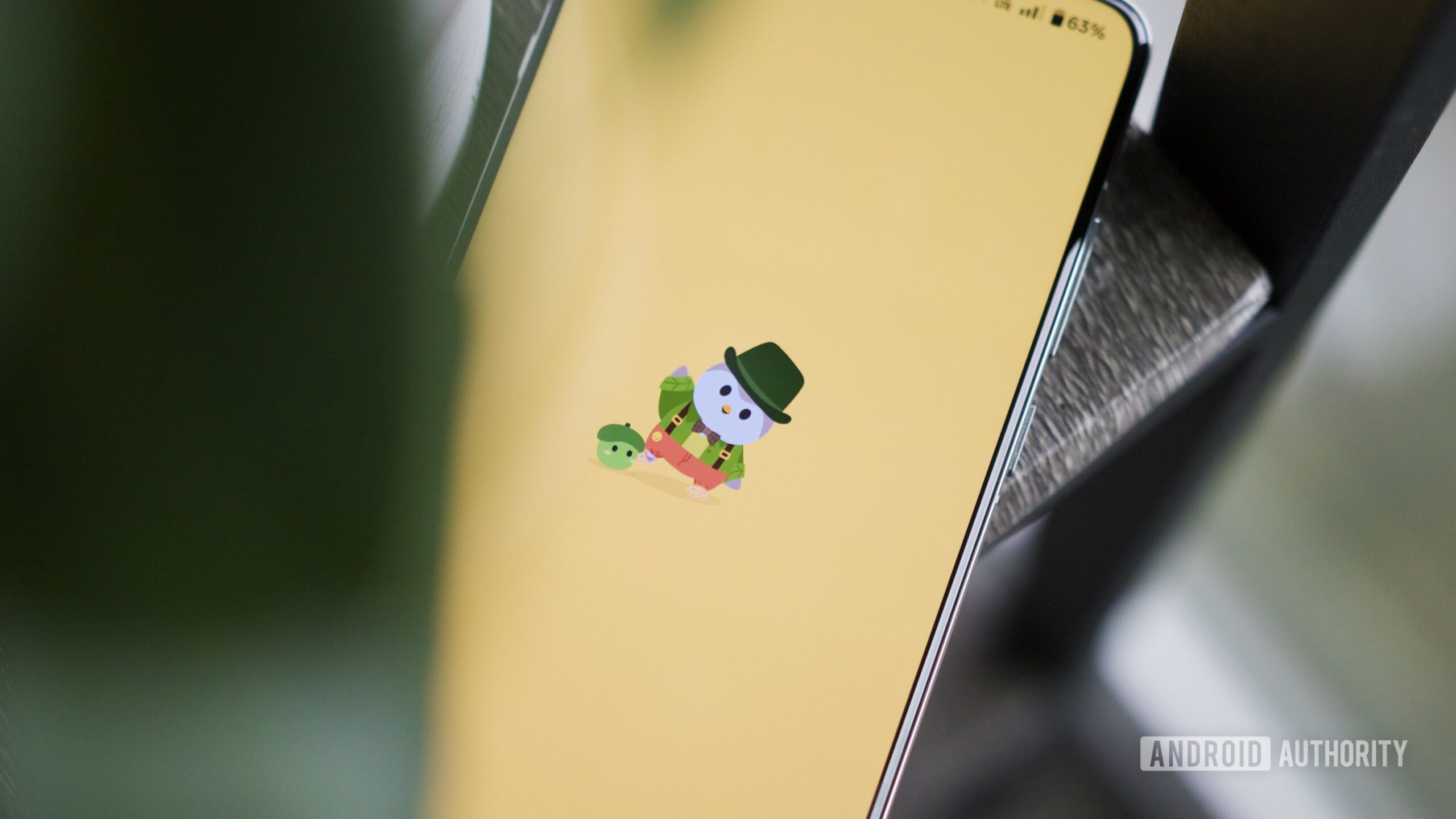 Finch bird character on an Android phone.