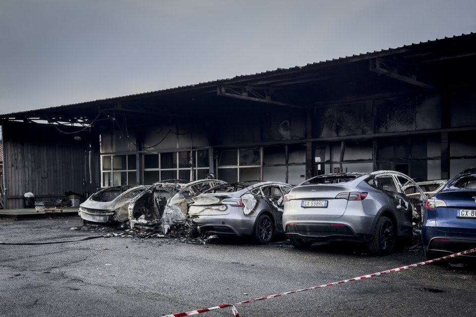 Burned Tesla cars at a dealership in Rome.