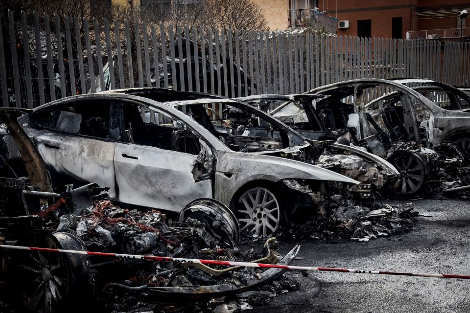 Burned-out Teslas at a dealership.