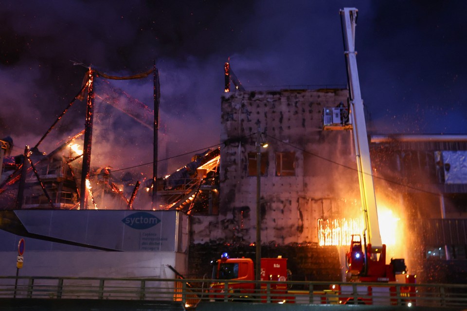 Fire trucks at a building fire.
