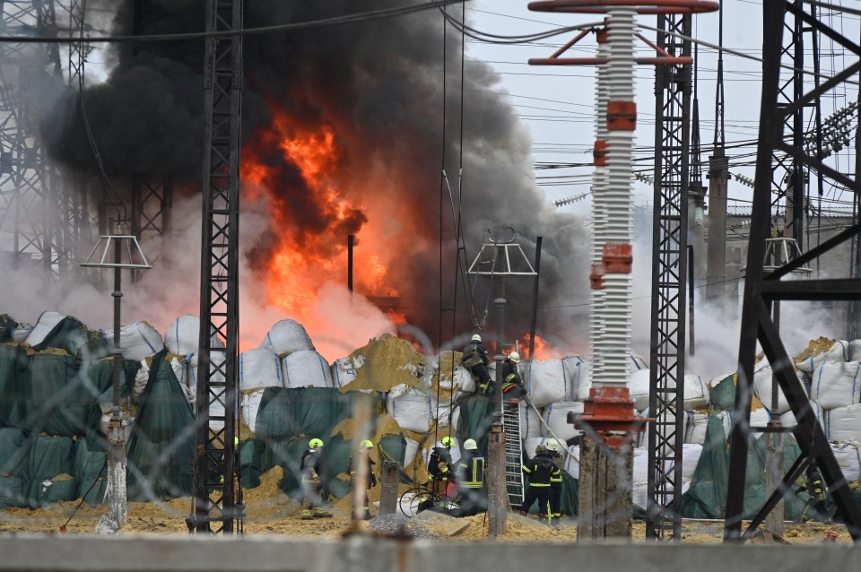 Firefighters extinguishing a fire at an electrical substation.