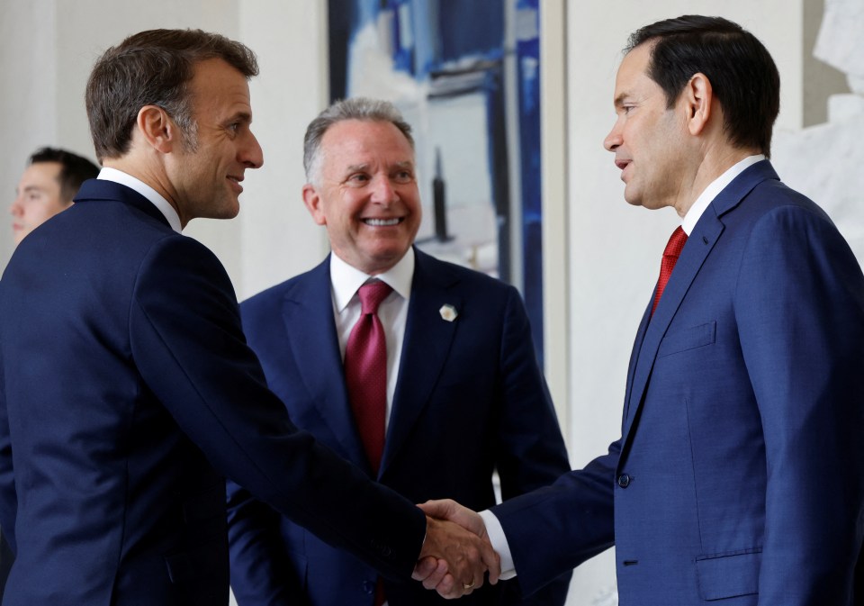 Emmanuel Macron shaking hands with Steve Witkoff and Marco Rubio at the Elysee Palace.