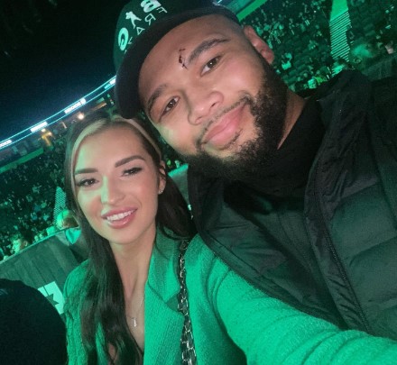 Frazer Clarke and his girlfriend at a boxing match.