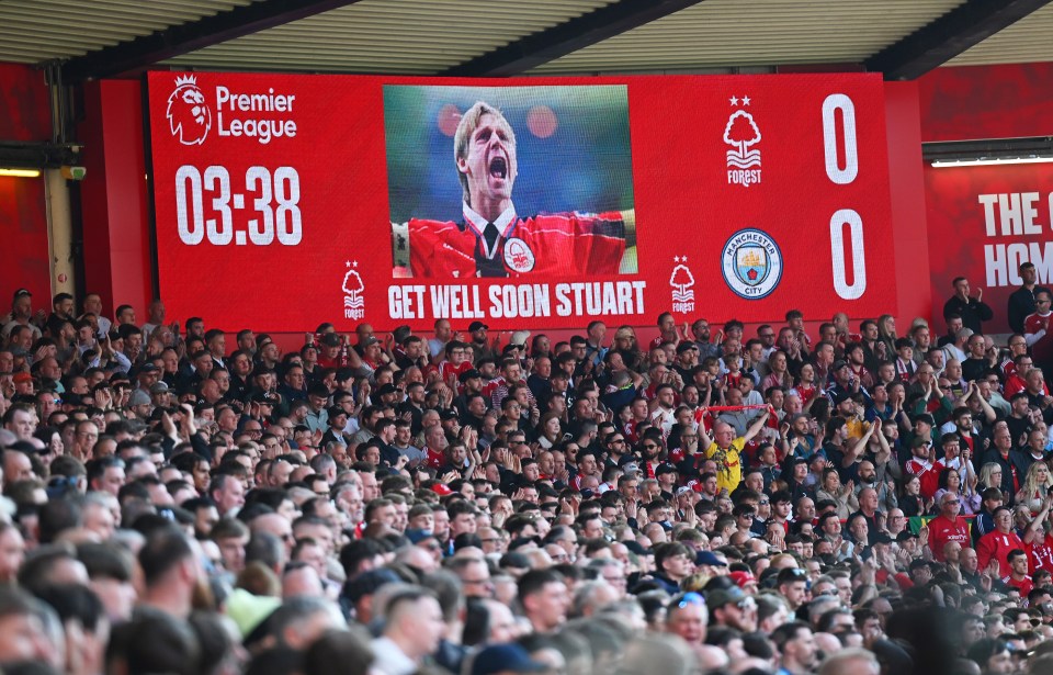 LED scoreboard displaying "Get Well Soon Stuart" and game score.