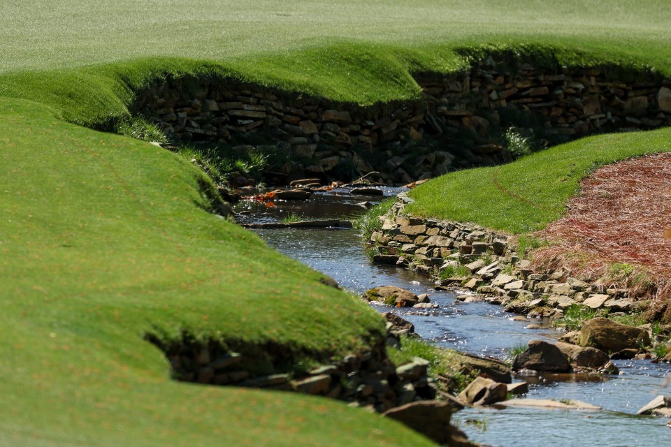 Rae’s Creek runs alongside the 13th at Augusta