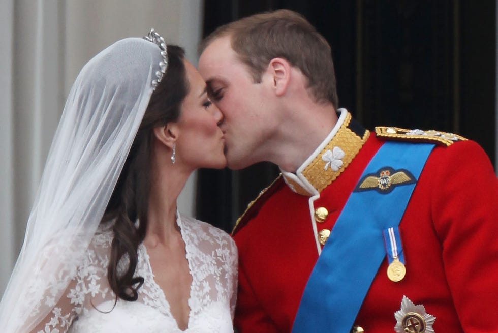 london, england april 29: their royal highnesses prince william, duke of cambridge and catherine, duchess of cambridge kiss on the balcony at buckingham palace on april 29, 2011 in london, england. the marriage of the second in line to the british throne was led by the archbishop of canterbury and was attended by 1900 guests, including foreign royal family members and heads of state. thousands of well wishers from around the world have also flocked to london to witness the spectacle and pageantry of the royal wedding. (photo by peter macdiarmid/getty images)