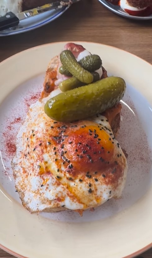 Fried egg and pickled gherkins on toast.