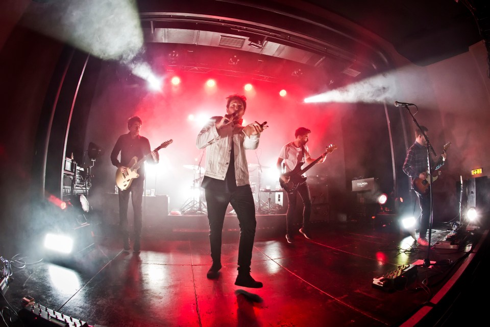 Band performing on stage.