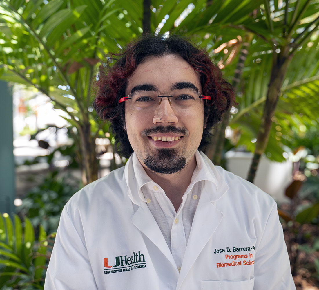 Jose Domingo “Pepe” Barrera-Paez, in a white clinic coat