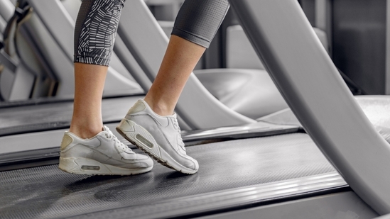 Incline walking helps you enter the fat-burning heart rate zone, maximising energy use and boosting endurance. (Shutterstock)