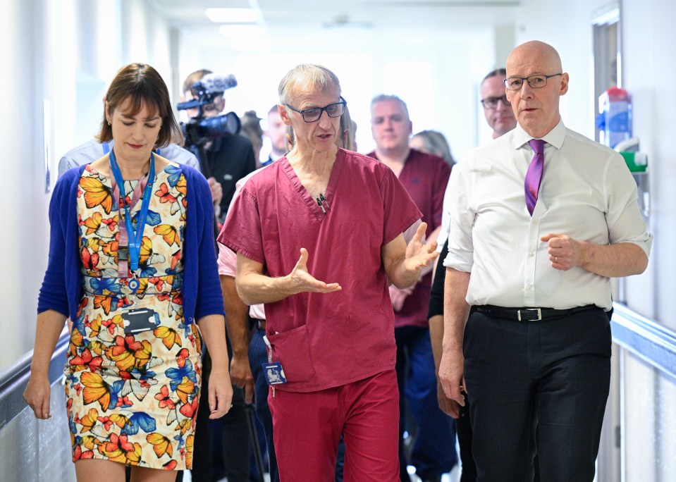 Juliette Murray, Deputy Medical Director, with colleagues at a hospital.