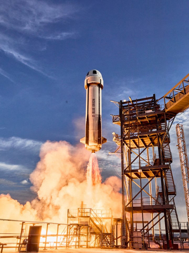 Blue Origin New Shepard rocket launching.