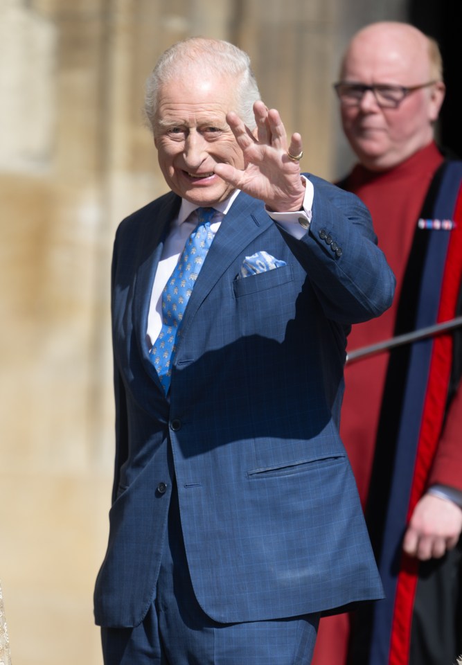 King Charles III waving at an Easter service.