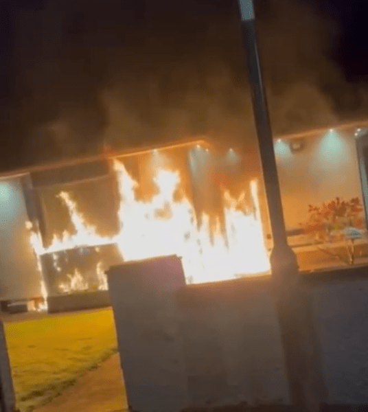 Houses engulfed in flames.