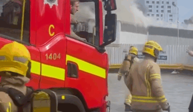 Firefighters evacuate major UK train station and shops evacuated as plumes of smoke spark travel chaos