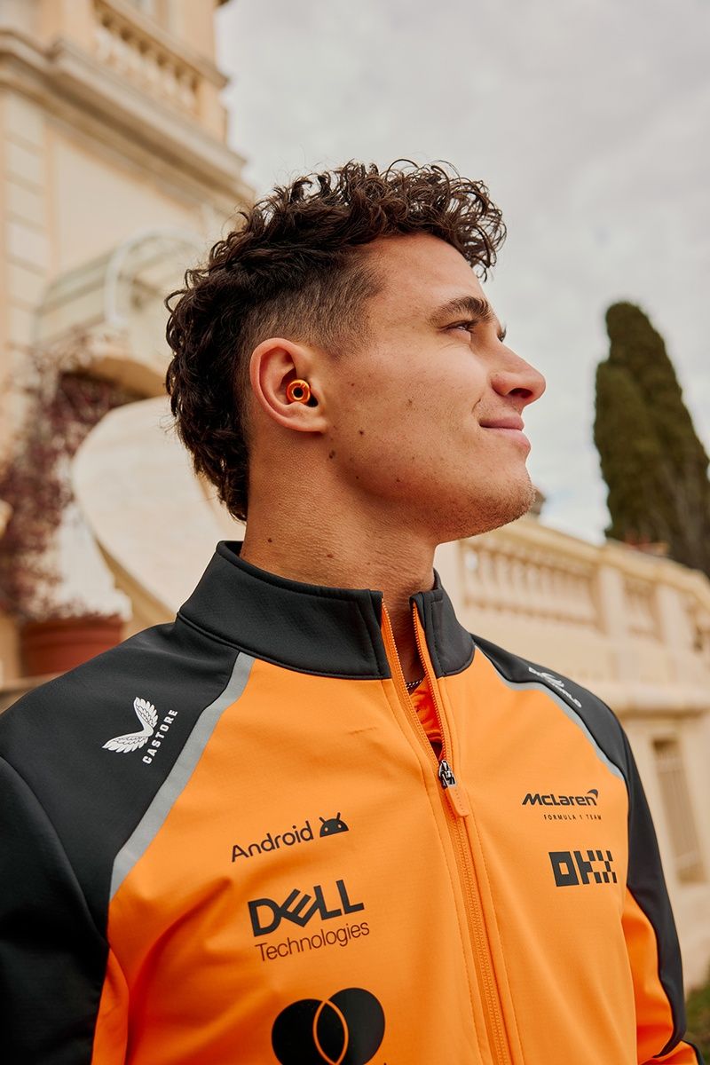 Lando Norris wears the Loop earbuds 