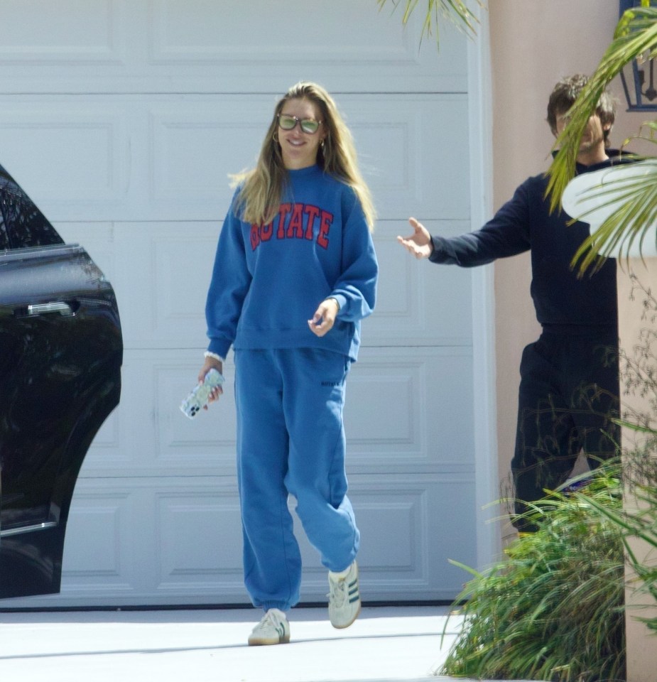 Louis Tomlinson and Zara McDermott leaving their Airbnb.