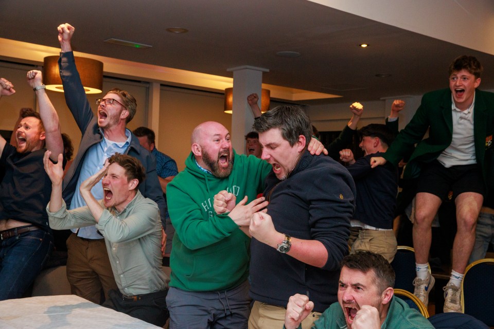 Members of Rory McIlroy's Holywood Golf Club celebrating his US Masters win.